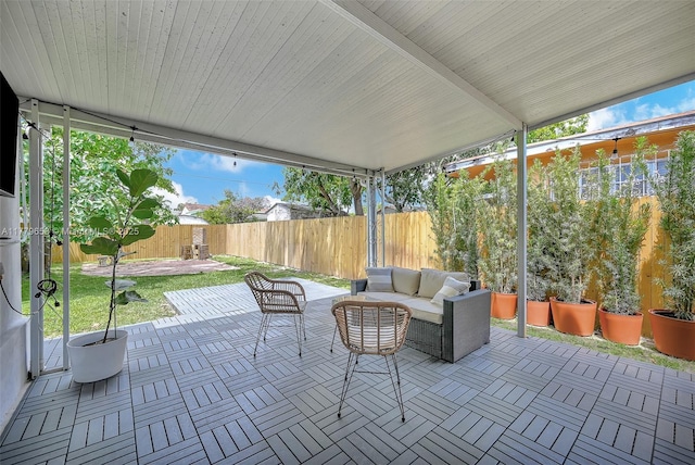 2019 SW 17th Ter, Miami, FL 33145 - view of patio featuring a fenced backyard and an outdoor living space