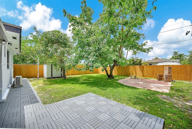2019 SW 17th Ter, Miami, FL 33145 - view of yard with a patio area, a storage shed, an outbuilding, and a cooling unit