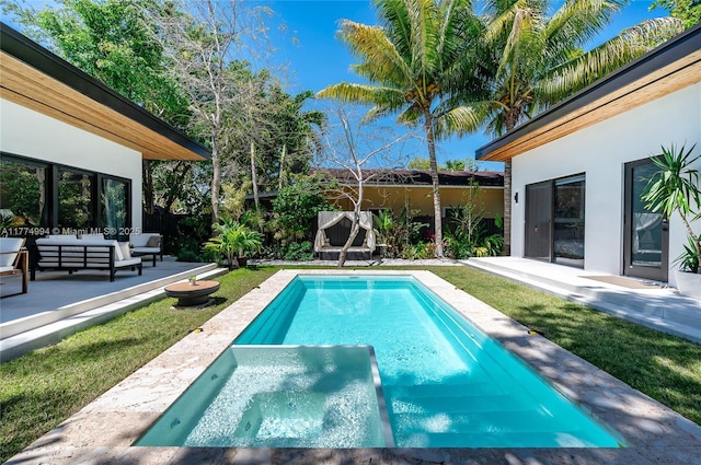 view of pool with a patio area, fence, a fenced in pool, and an outdoor hangout area