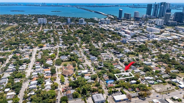 bird's eye view with a view of city and a water view