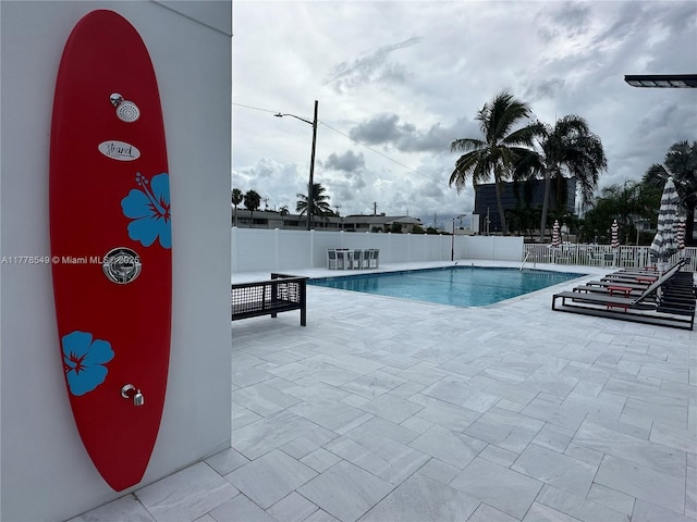 801 Atlantic Shores Blvd Unit 203, Hallandale Beach, FL 33009 - community pool with a patio area and fence