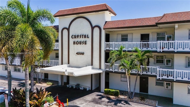 4200 Crystal Lake Dr Unit 303, Deerfield Beach, FL 33064 - view of building exterior with aphalt driveway