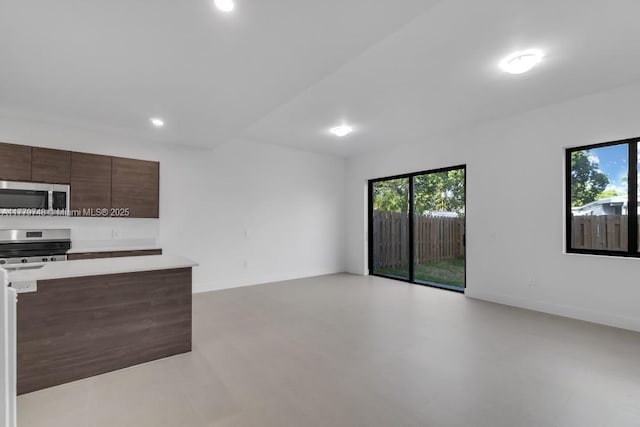 34441 SW 189th Ct, Homestead, FL 33034 - kitchen featuring appliances with stainless steel finishes, plenty of natural light, light countertops, modern cabinets, and recessed lighting