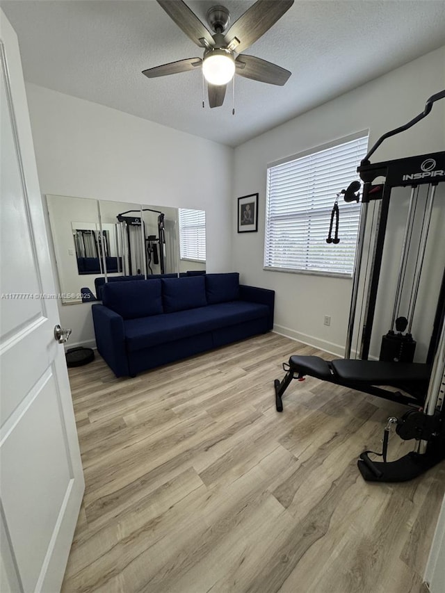 4849 NW 57th Ct, Tamarac, FL 33319 - interior space with ceiling fan, baseboards, wood finished floors, and a textured ceiling