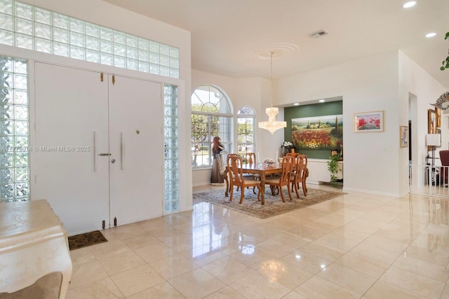 8350 SW 138th Ter, Palmetto Bay, FL 33158 - foyer entrance with a chandelier, baseboards, visible vents, and recessed lighting