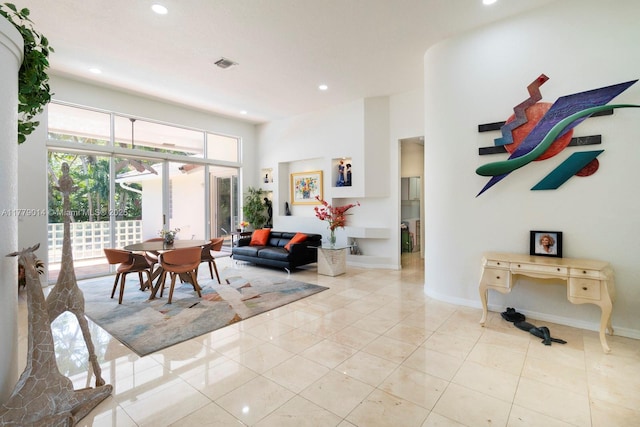 8350 SW 138th Ter, Palmetto Bay, FL 33158 - dining room featuring light tile patterned floors, visible vents, recessed lighting, a high ceiling, and baseboards