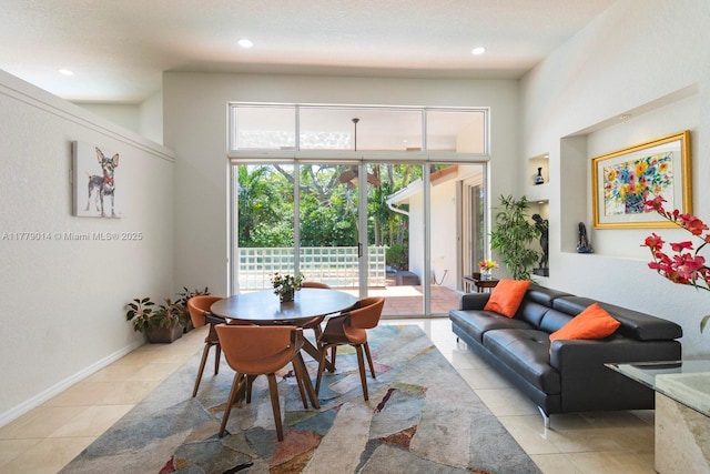 8350 SW 138th Ter, Palmetto Bay, FL 33158 - dining area with recessed lighting, a towering ceiling, baseboards, and light tile patterned flooring