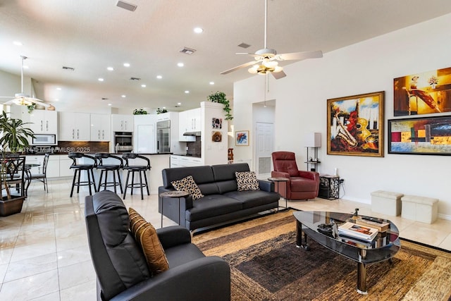 8350 SW 138th Ter, Palmetto Bay, FL 33158 - living area with visible vents, ceiling fan, recessed lighting, and a high ceiling