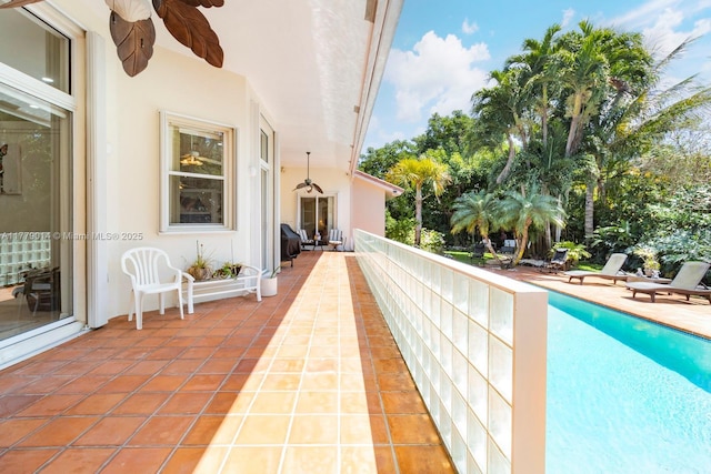 8350 SW 138th Ter, Palmetto Bay, FL 33158 - view of patio featuring an outdoor pool