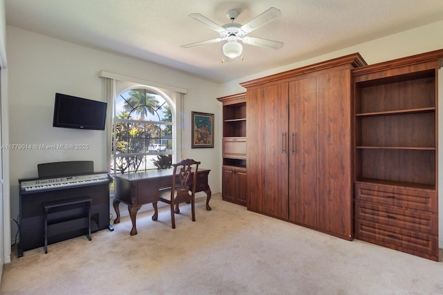 8350 SW 138th Ter, Palmetto Bay, FL 33158 - home office with light colored carpet, a ceiling fan, and a textured ceiling