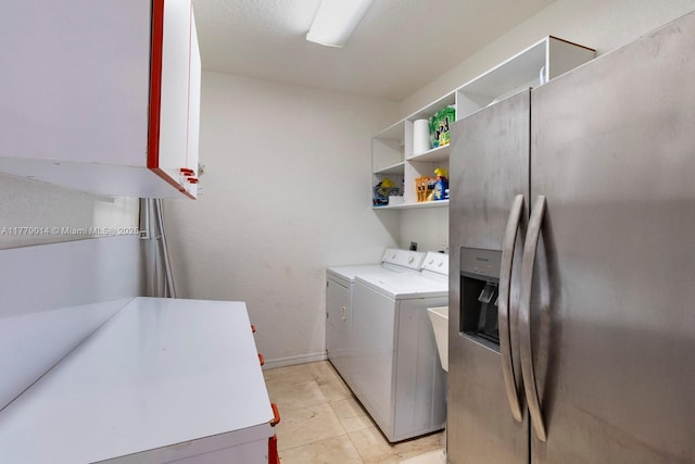 8350 SW 138th Ter, Palmetto Bay, FL 33158 - clothes washing area with cabinet space, light tile patterned floors, and separate washer and dryer