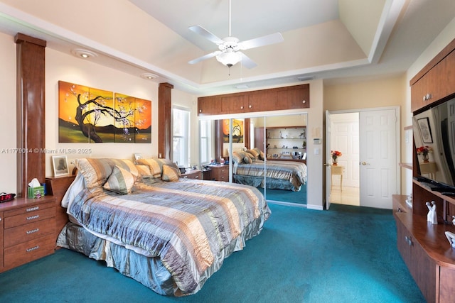 8350 SW 138th Ter, Palmetto Bay, FL 33158 - carpeted bedroom with visible vents and a tray ceiling