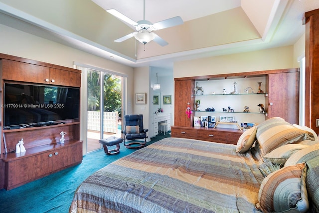 8350 SW 138th Ter, Palmetto Bay, FL 33158 - bedroom featuring a tray ceiling, access to exterior, carpet flooring, and ceiling fan