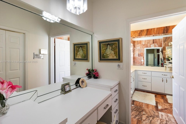 8350 SW 138th Ter, Palmetto Bay, FL 33158 - bathroom featuring a chandelier and vanity