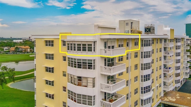 view of property with a water view