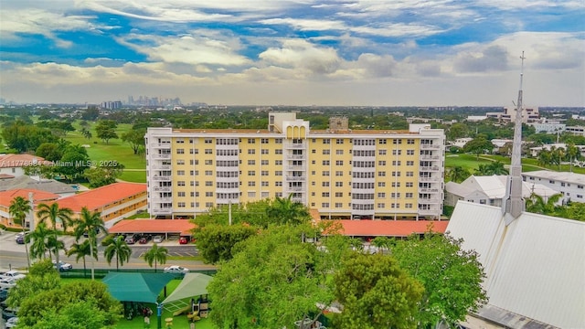 birds eye view of property with a view of city