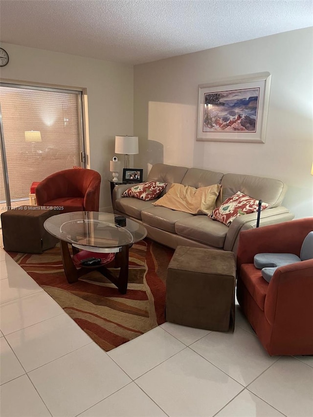 6200 NW 44th St Unit 204, Lauderhill, FL 33319 - tiled living room with a textured ceiling