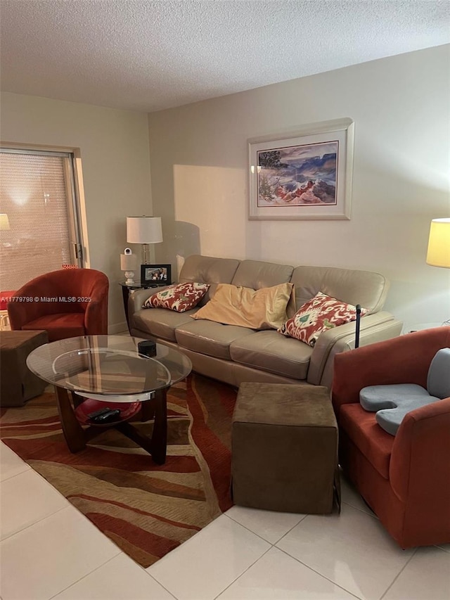 6200 NW 44th St Unit 204, Lauderhill, FL 33319 - tiled living area featuring a textured ceiling