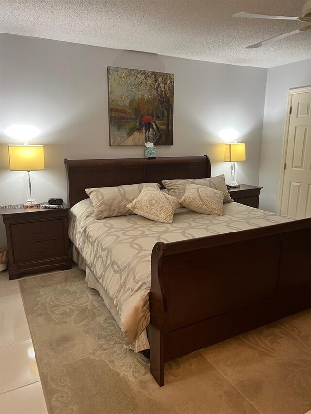 6200 NW 44th St Unit 204, Lauderhill, FL 33319 - bedroom featuring a textured ceiling and tile patterned flooring