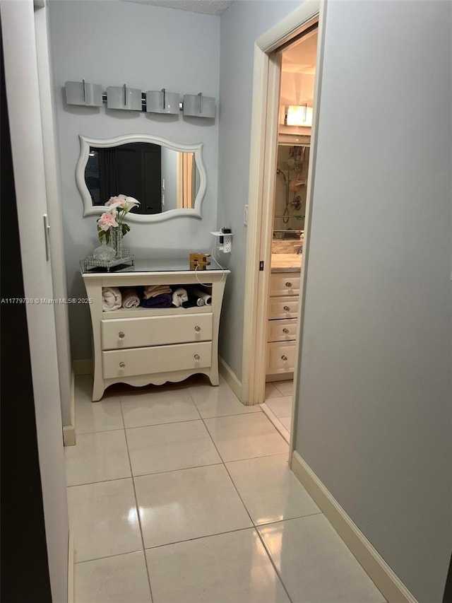 6200 NW 44th St Unit 204, Lauderhill, FL 33319 - interior space with vanity, baseboards, and tile patterned flooring
