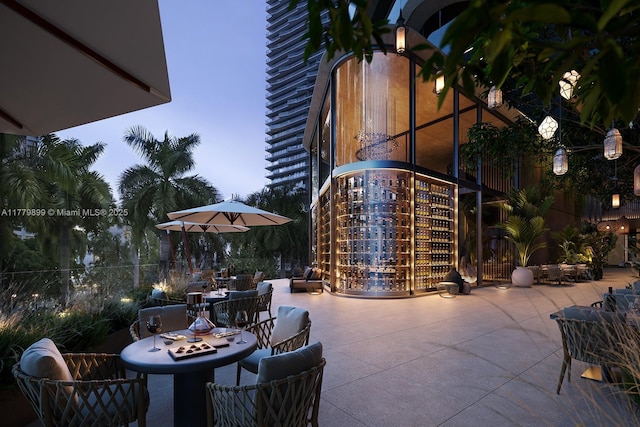 1210 Brickell Ave Unit 4804, Miami, FL 33131 - view of patio / terrace with outdoor dining space and fence