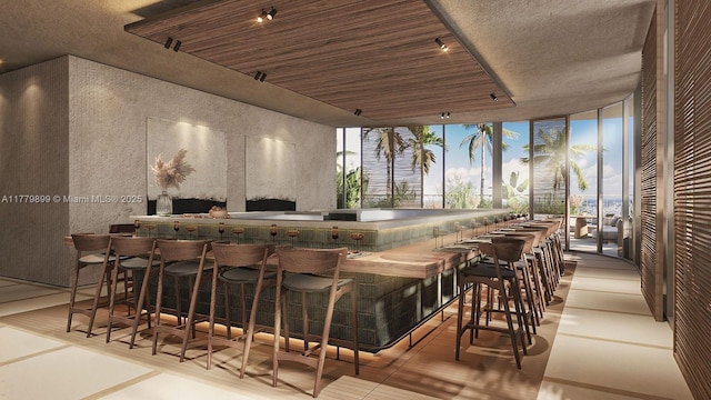 1210 Brickell Ave Unit 4804, Miami, FL 33131 - interior space featuring a bar, a wall of windows, rail lighting, and a fireplace
