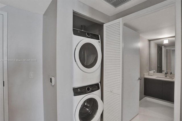 300 Sunny Isles Blvd Unit 4-903, Sunny Isles Beach, FL 33160 - laundry room with stacked washer / dryer