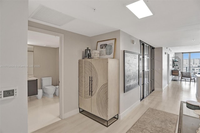 300 Sunny Isles Blvd Unit 4-903, Sunny Isles Beach, FL 33160 - hall featuring wood finished floors and baseboards