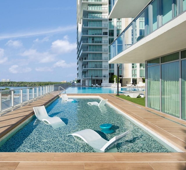300 Sunny Isles Blvd Unit 4-903, Sunny Isles Beach, FL 33160 - community pool featuring a patio area