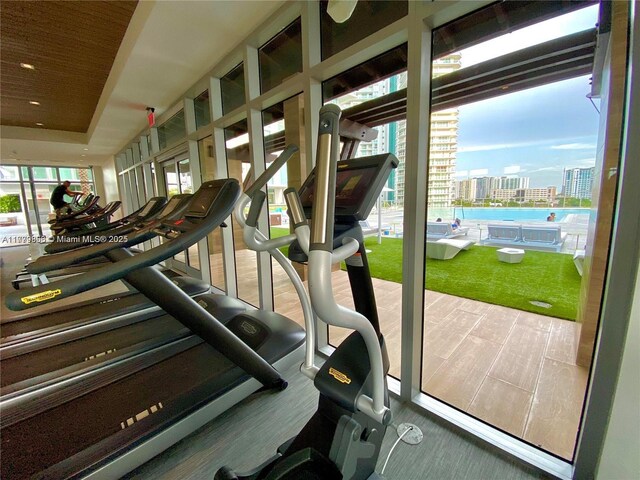 300 Sunny Isles Blvd Unit 4-903, Sunny Isles Beach, FL 33160 - exercise room with healthy amount of natural light, a city view, and a wall of windows