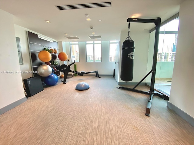 300 Sunny Isles Blvd Unit 4-903, Sunny Isles Beach, FL 33160 - workout room featuring plenty of natural light and carpet
