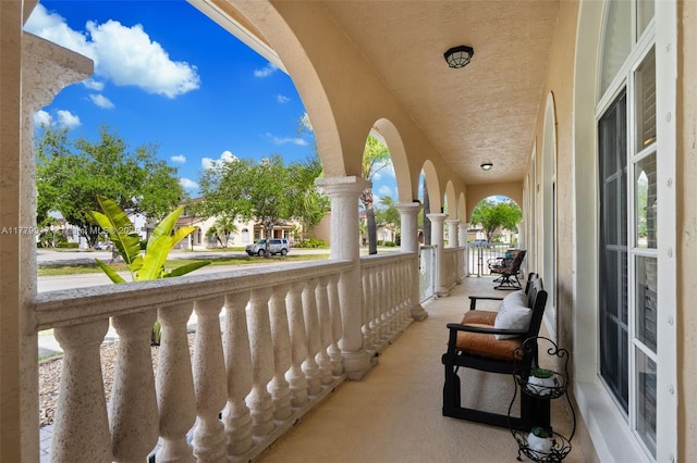 balcony featuring a porch