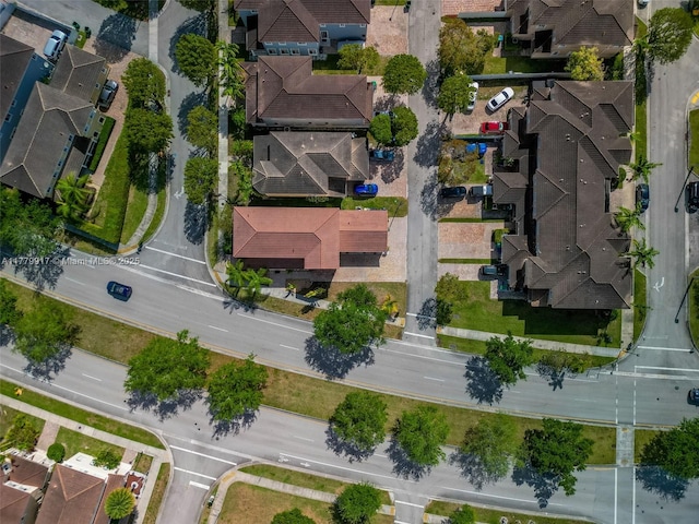 birds eye view of property with a residential view