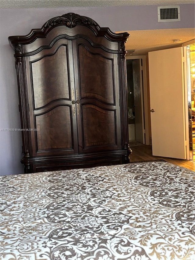 1865 S Ocean Dr Unit 3F, Hallandale Beach, FL 33009 - detailed view of a textured ceiling and wood finished floors