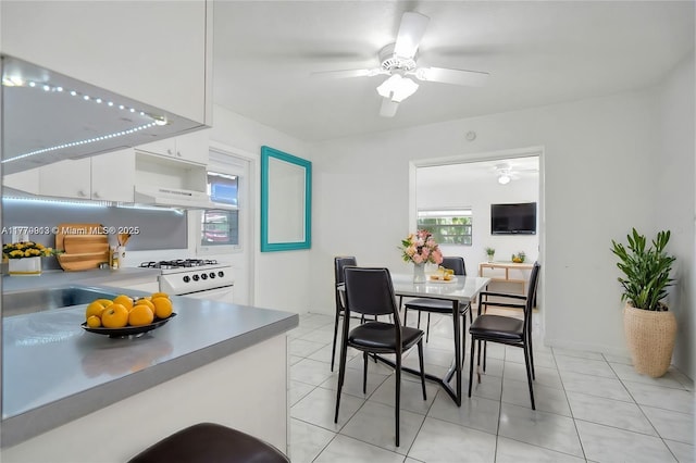 2001 N 26th Ave, Hollywood, FL 33020 - dining area featuring a ceiling fan and light tile patterned flooring