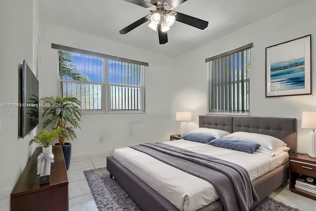 2001 N 26th Ave, Hollywood, FL 33020 - bedroom with light tile patterned flooring and a ceiling fan
