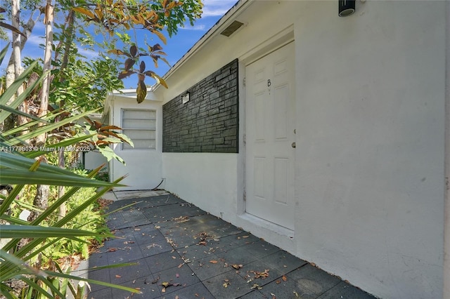 2001 N 26th Ave, Hollywood, FL 33020 - doorway to property featuring stucco siding
