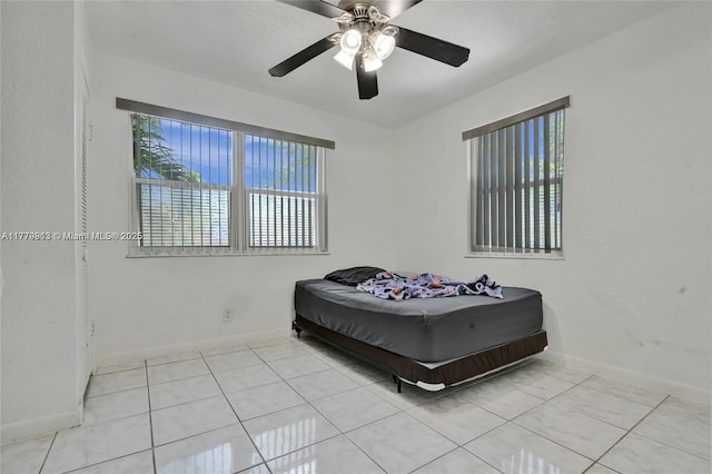 2001 N 26th Ave, Hollywood, FL 33020 - bedroom with multiple windows, ceiling fan, and tile patterned flooring