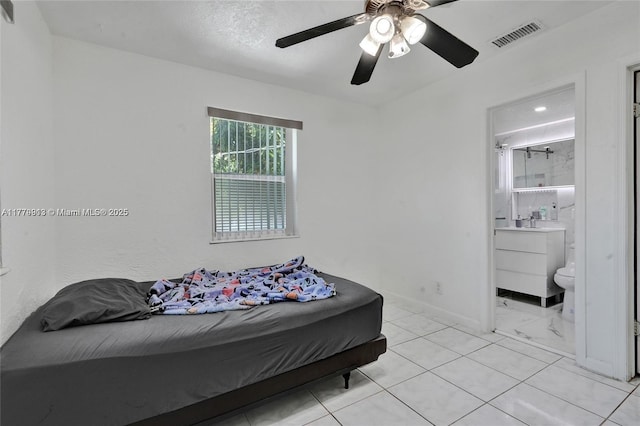 2001 N 26th Ave, Hollywood, FL 33020 - bedroom featuring a ceiling fan and connected bathroom
