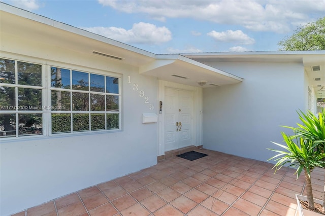 13925 SW 74th Ave, Palmetto Bay, FL 33158 - entrance to property featuring stucco siding