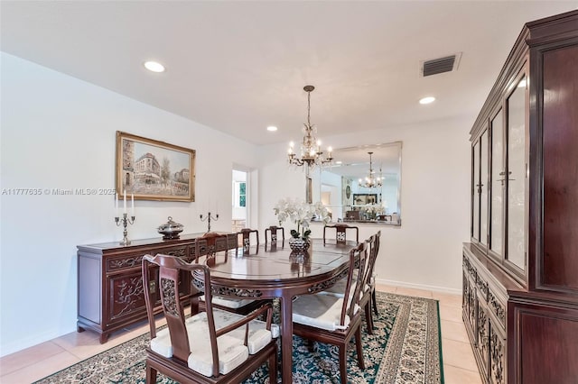 13925 SW 74th Ave, Palmetto Bay, FL 33158 - dining room with light tile patterned floors, a notable chandelier, visible vents, and recessed lighting