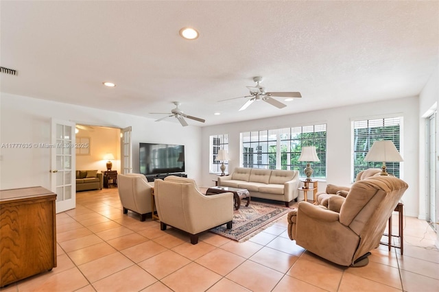 13925 SW 74th Ave, Palmetto Bay, FL 33158 - living area with a textured ceiling, ceiling fan, light tile patterned floors, and recessed lighting