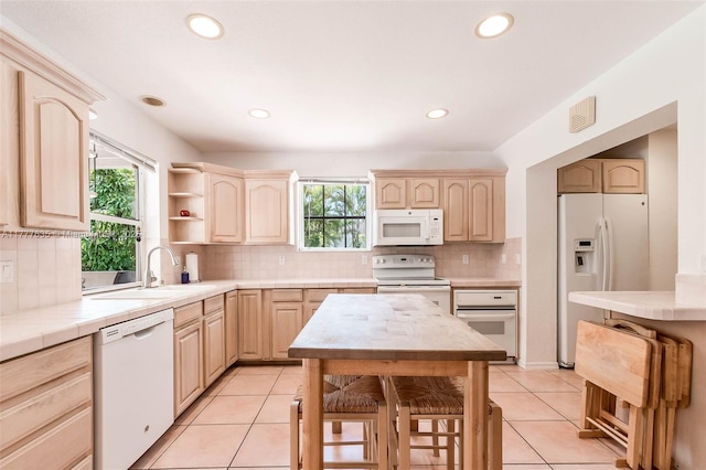 13925 SW 74th Ave, Palmetto Bay, FL 33158 - kitchen with white appliances and light brown cabinets