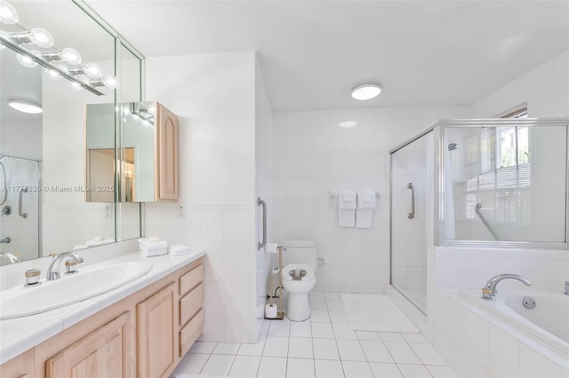 13925 SW 74th Ave, Palmetto Bay, FL 33158 - full bathroom with vanity, tile patterned flooring, toilet, tile walls, and a stall shower