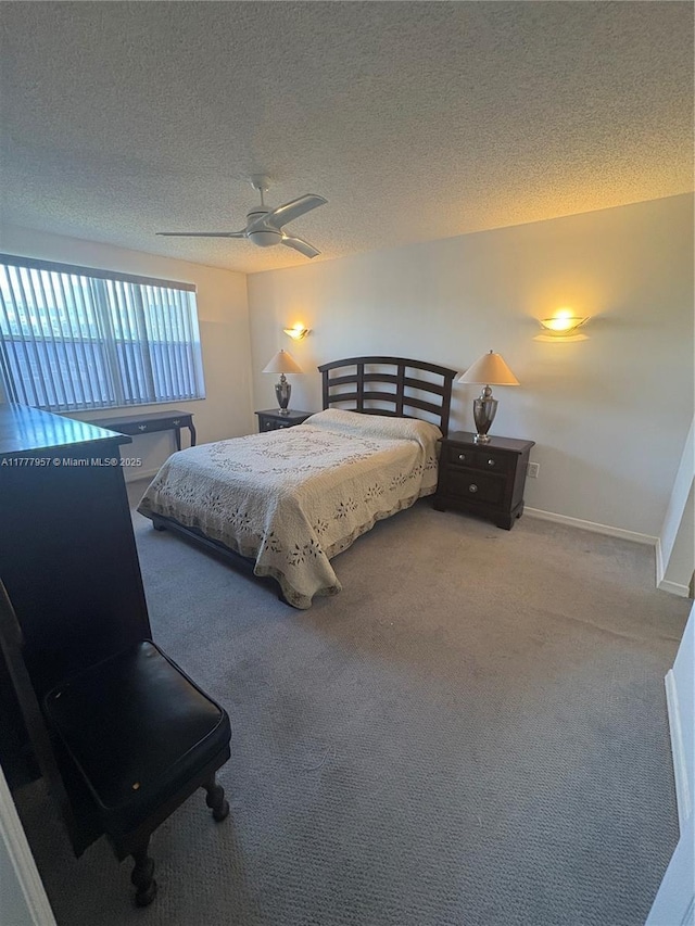 10133 NW 24th Pl Unit 206, Sunrise, FL 33322 - bedroom featuring a textured ceiling, baseboards, a ceiling fan, and carpet floors