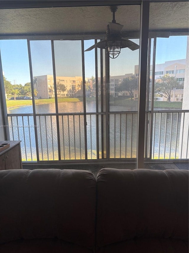 10133 NW 24th Pl Unit 206, Sunrise, FL 33322 - unfurnished sunroom featuring a water view