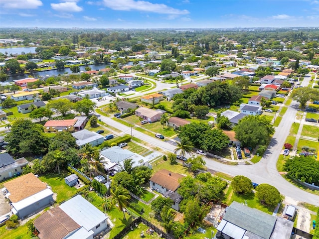 aerial view featuring a water view and a residential view