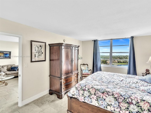6770 Indian Creek Dr Unit 7K, Miami Beach, FL 33141 - bedroom featuring baseboards