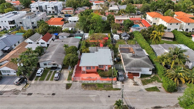 birds eye view of property with a residential view