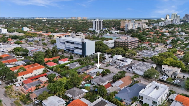 drone / aerial view featuring a city view
